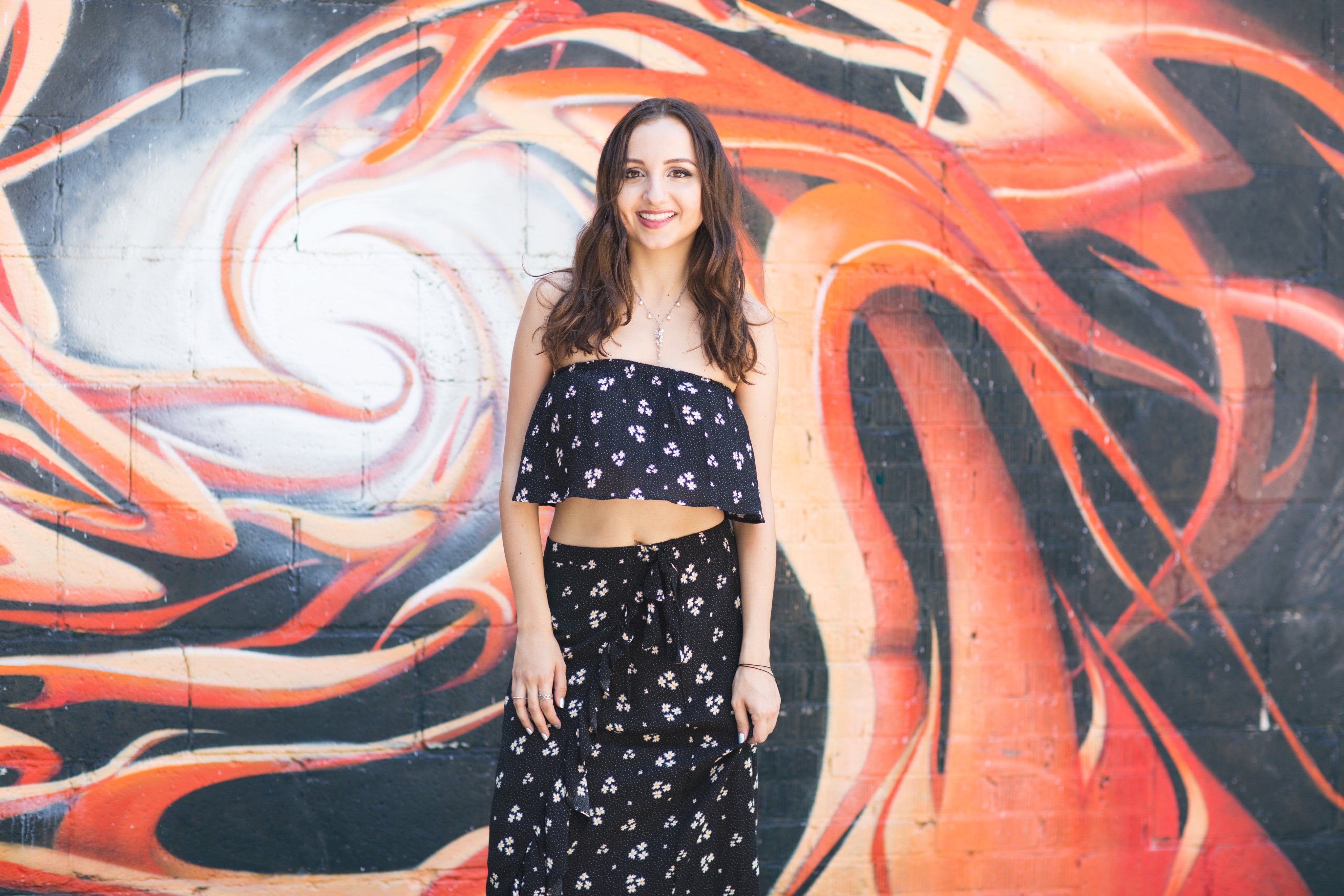 files/woman-poses-by-alley-wall.jpg